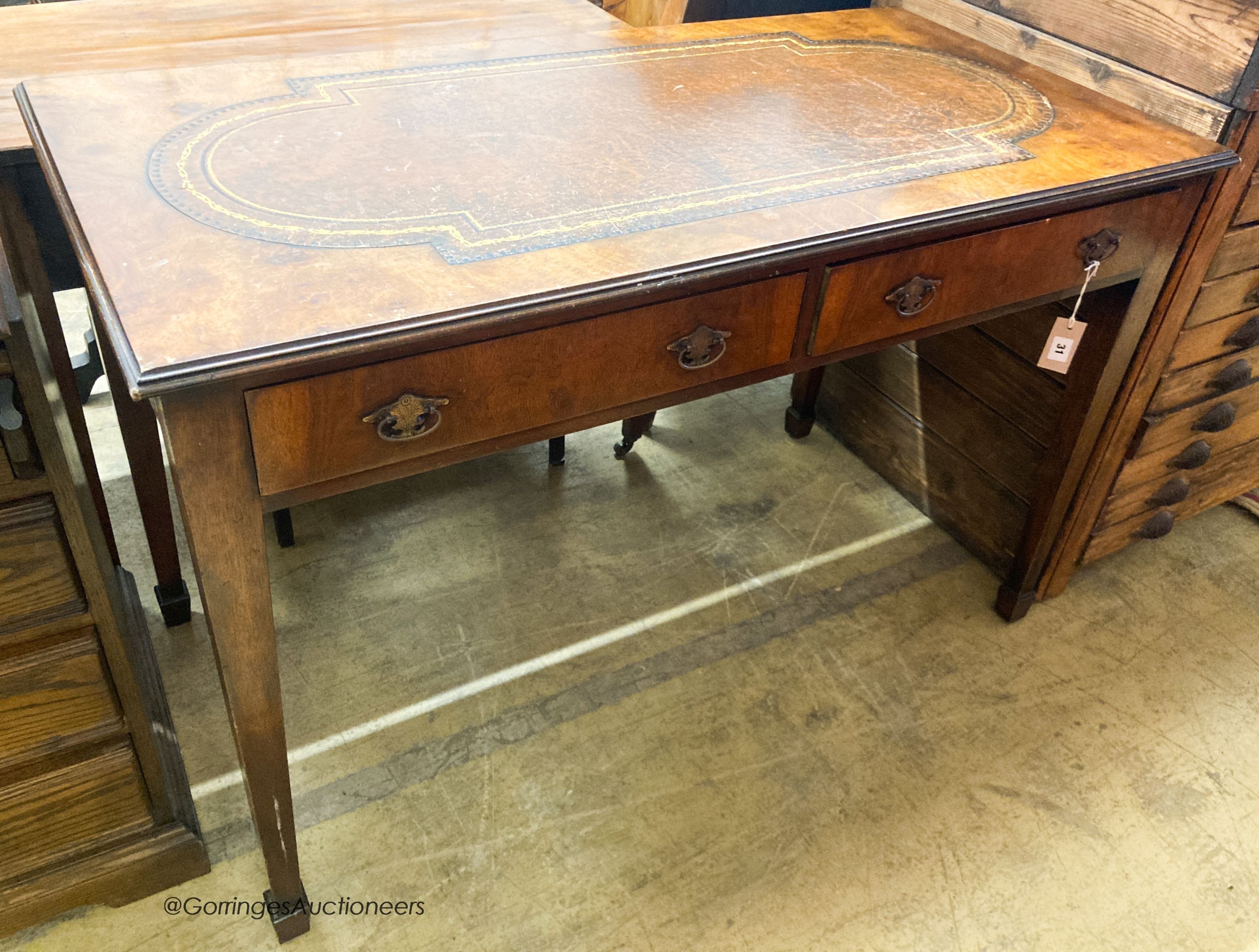A George III style walnut two drawer writing table, W.122cm D.60cm H.80cm